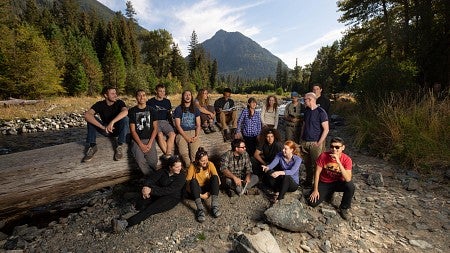 Boulay (back row, blue-plaid shirt) used the wolf issue to teach respect for conflicting opinions. Photo by Charlie Litchfield, University Communications