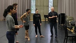 Walter Kennedy (far right) works with dance students at the UO's School of Music and Dance. He recently produced a documentary on dancer and activist Bella Lewitzky.