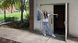Happy student at the ROSE Room door