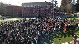 Hundreds of students gathered on the EMU Green for National School Walkout Day