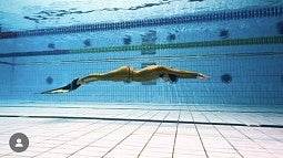 Swimmer underwater in pool