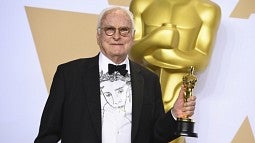 Filmmaker James Ivory, '51, with his Oscar for best adapted screenplay. 