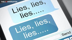 Smartphone texting the word 'lies'