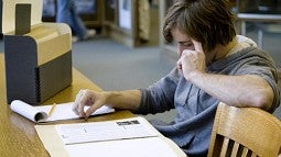 A student doing research in the UO Libraries' special collections