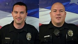 UOPD officers Anthony Button (left) and John Loos