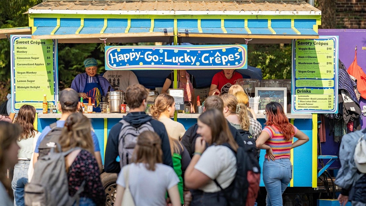 People line up to order food at Happy-Go-Lucky Crepes