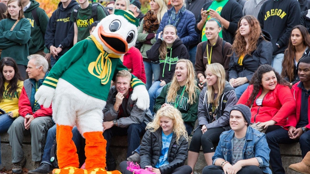 The Duck with a crowd of students