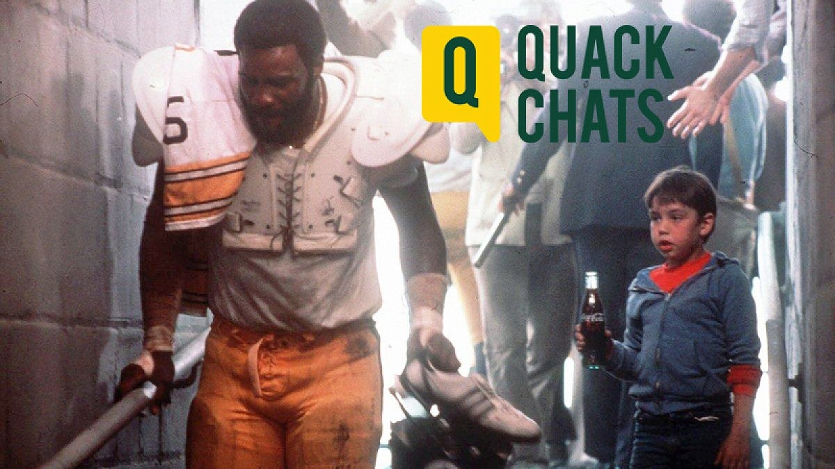 Scene from Coca-Cola's 1980 Super Bowl ad with Mean Joe Greene and a little boy
