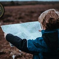 Child looking at map