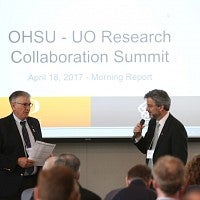 OHSU's Daniel Dorsa with the UO's Patrick Phillips