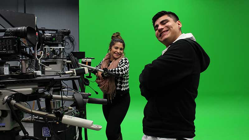 DuckTV students play all roles on the broadcast network team. Lauren Rodriguez and Cesc Romero work the camera. 