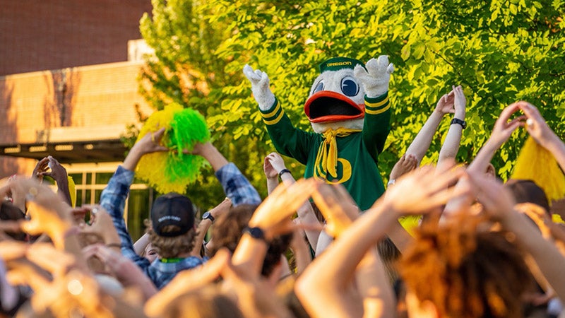 The Duck with students doing the &quot;O&quot;