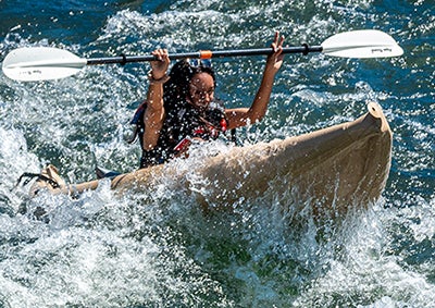 IPCA student kayaking in rapids