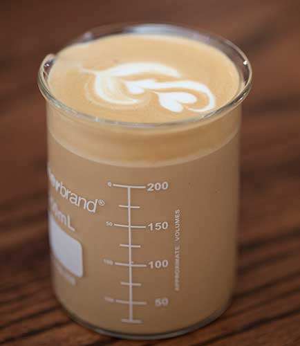 Coffee with a foam heart pattern