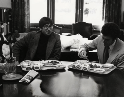 Director John Landis (left) joins President William Beaty Boyd for lunch at his office in Johnson Hall. Boyd insisted that UO not be mentioned anywhere in Animal House.