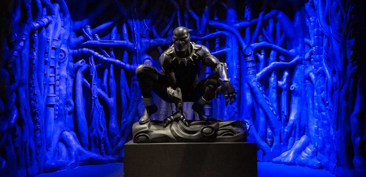 Life-sized sculpture of a crouching Black Panther