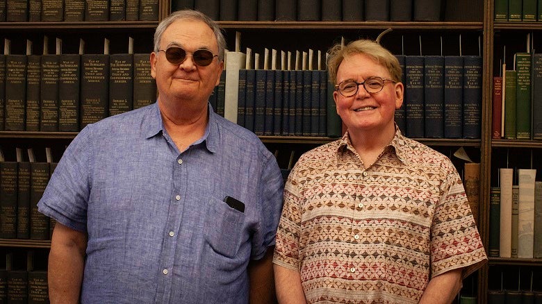 David de Lorenzo, the Giustina Director of Special Collections and Bruce Tabb, Rare Books Curator with UO Libraries