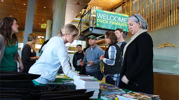 Families checking in for Fall Family Weekend in the Ford Alumni Center.