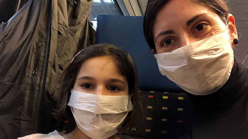 Melissa Graboyes and daughter wearing masks
