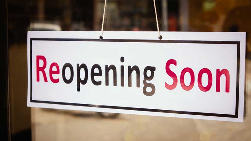 Reopening sign in store window