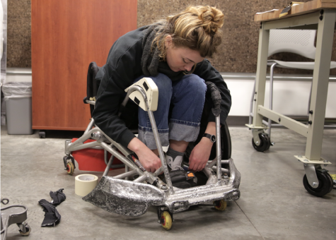 Sara Novak explores connection points in a wheelchair.