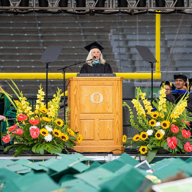 Ginevra Ralph, chair, UO Board of Trustees, speaking at the 2022 UO Graduation