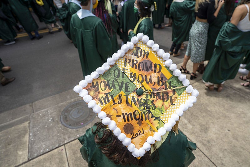A graduation cap reading &quot;I'm proud of you, but you've made mistakes - mom 2021&quot;