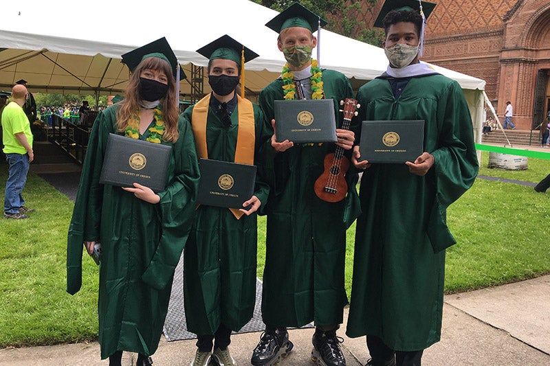 2021 UO Grads with diplomas