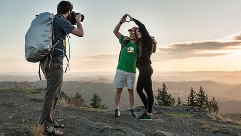 Justin Hartney shooting photos at the top of Spencer Butte