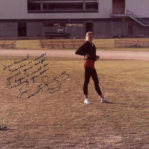 Still from the film 'Personal Best' showing a woman standing in a track field. Photo courtesy of Oregon Digital