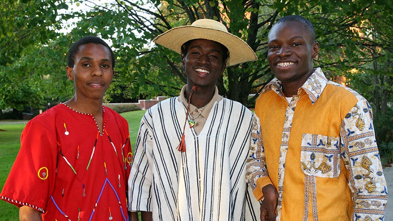 Students wearing culturally diverse formal wear