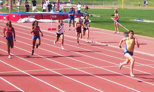 Jenna Prandini winning a race in high school