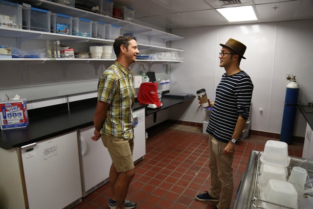 Steve Perry talking with Mark Curreyin the zebrafish lab