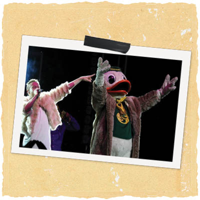The Duck on stage in a fur coat