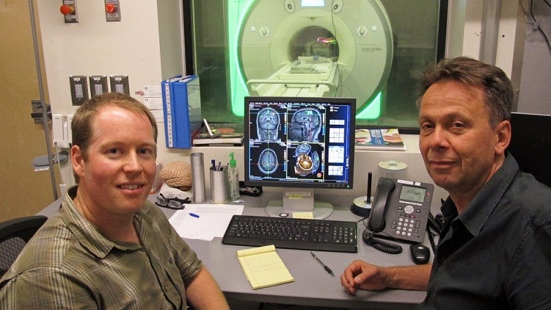 Jason Hubbard and Ulrich Mayr in MRI control room