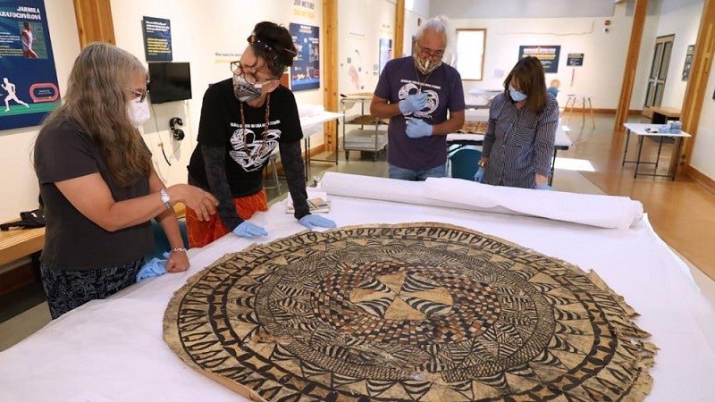 Researchers looking at tapa cloth