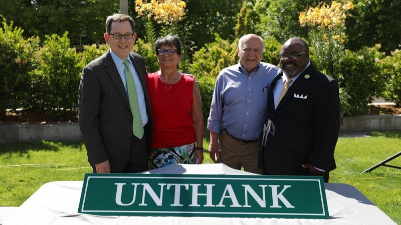 From left: UO President Michael Schill, Libby Unthank Tower (DeNorval Unthank's daughter), Otto Poticha and Greg Evans.