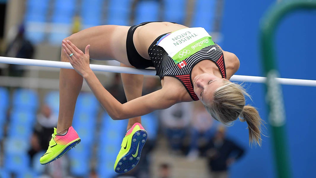Brianne Theisen-Eaton going over the bar in the high jump / Image by Kirby Lee