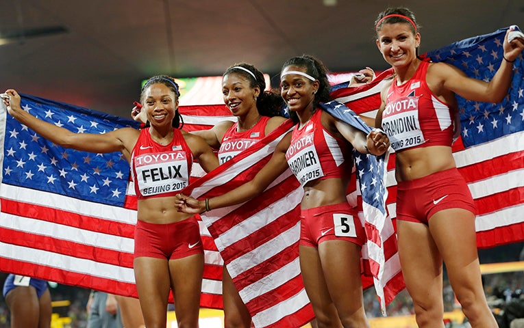Jenna Prandini celebrates with teammates Allyson Felix, Jasmine Todd, and English Gardner after finishing second in the women’s 4x100-meter relay final at the 2015 World Championships in Beijing.