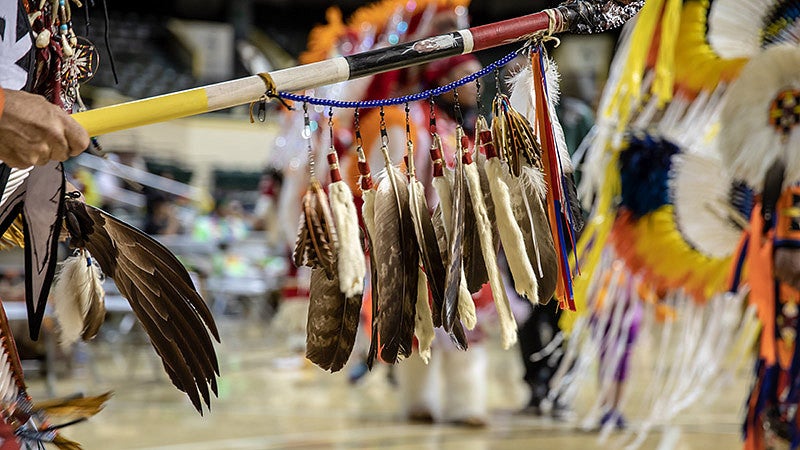 An Eagle staff held during the 2018 Mother's Day Powwow