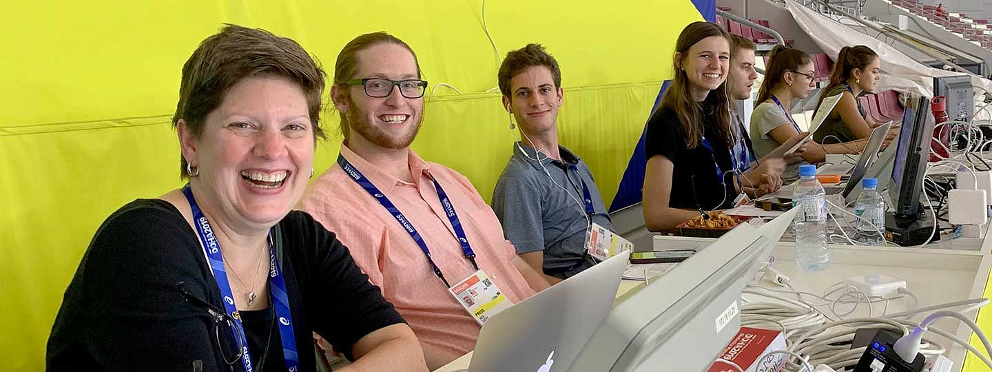 SOJC students sitting on press row covering the IAAF World Athletics Championships in Doha, Quatar