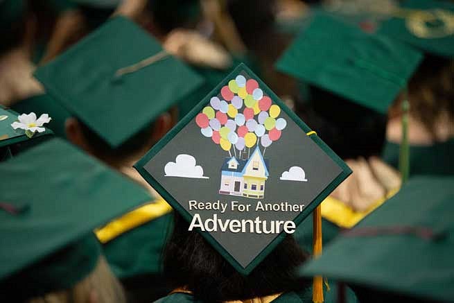 Mortar board that says Ready for Another Adventure