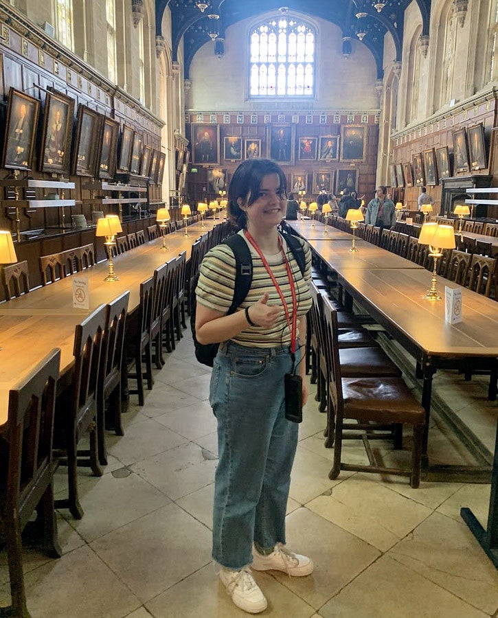 UO student Mollie Glover in the dining hall of Christ Church, an Oxford University College