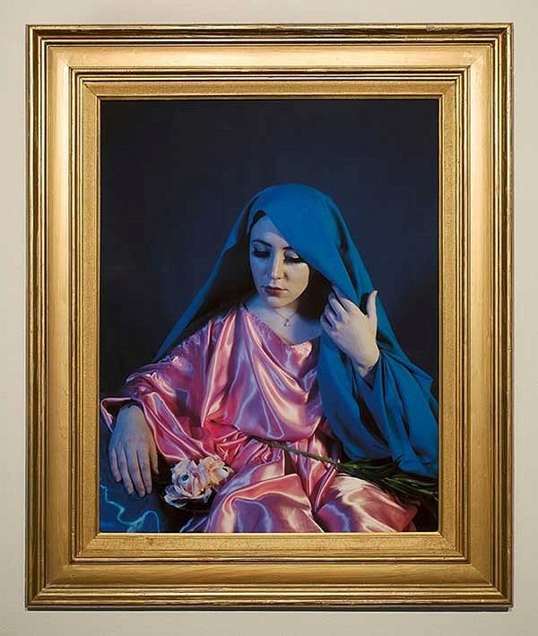 Framed image of a person with a headscarf