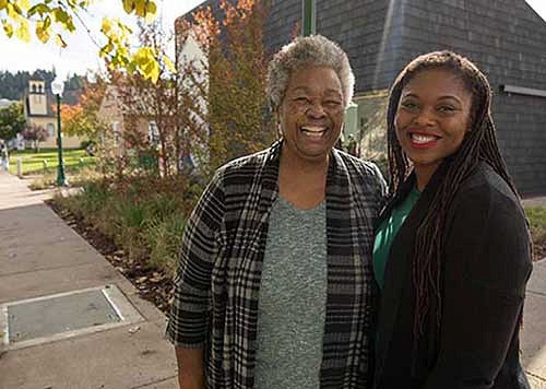 Lyllye Reynolds-Parker and Aris Hall in front of the Black Cultural Center