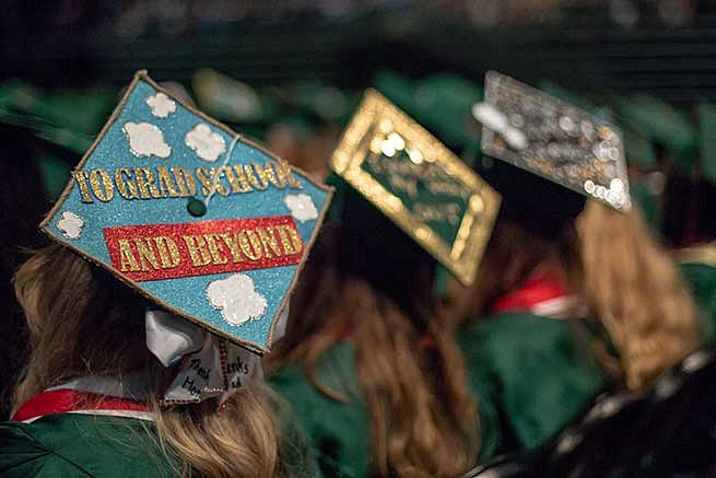 Graduation cap reads: To grad school and beyond.