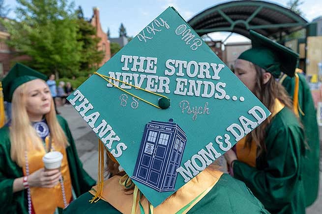 Graduation cap reads: The story never ends… thanks mom and dad.