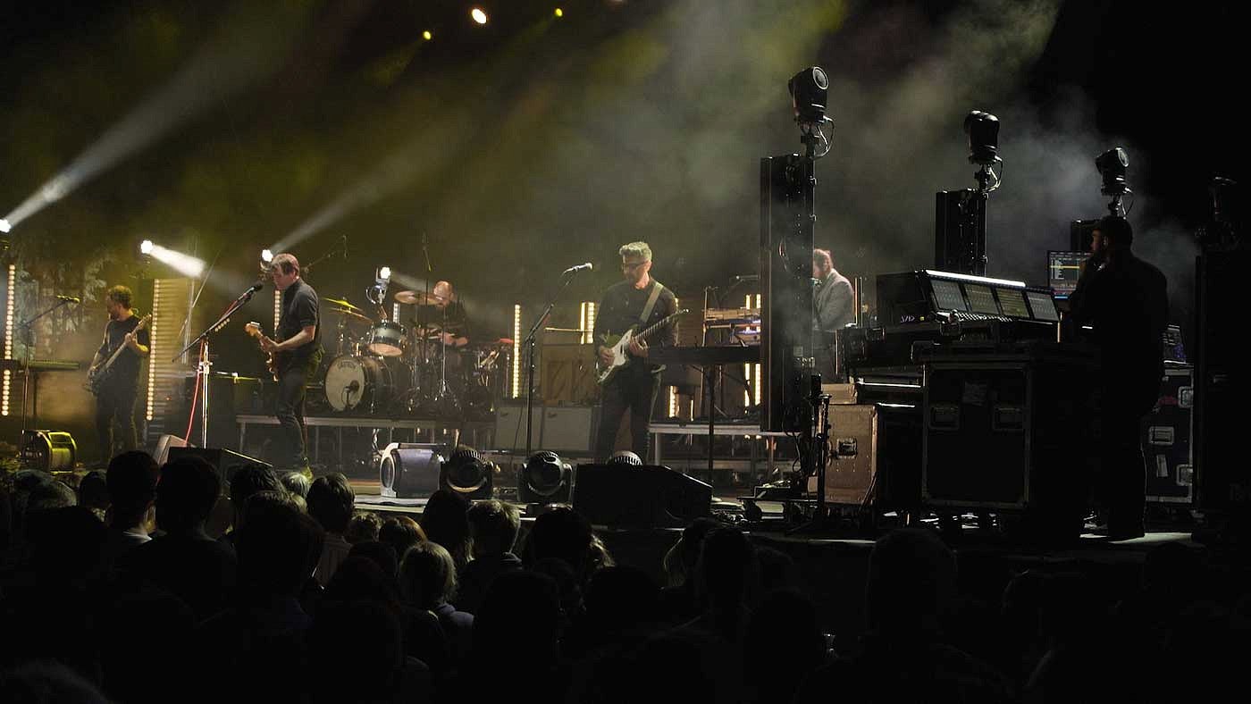 Death Cab for Cutie performing on stage