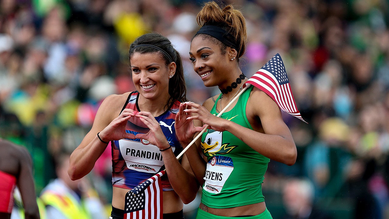Jenna Prandini and Deajah Stevens throw the O after both made the US Olympic Team in the women's 200 meters / ASSOCIATED PRESS