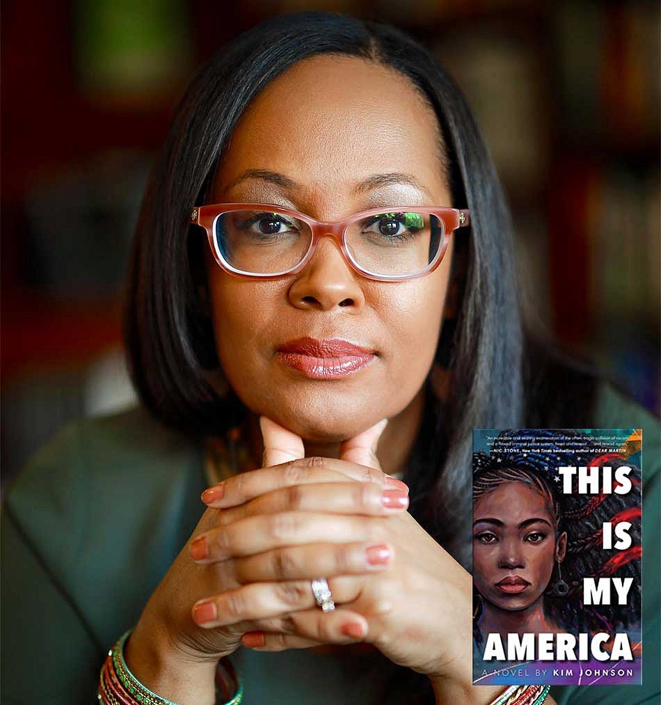 Kimberly Johnson portrait with the cover of her book "This is My America"
